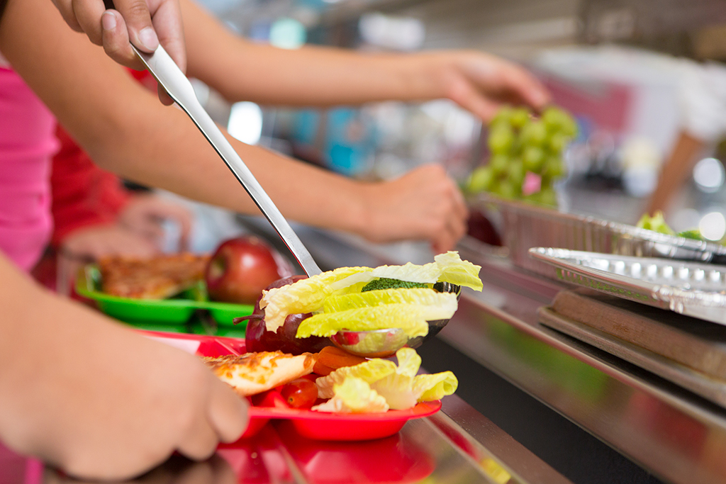Tuition and costs food being served in school cafeteria Triangle